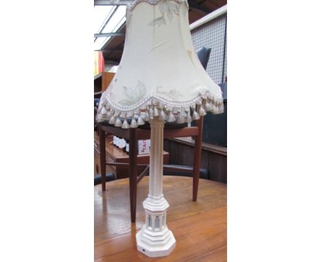 A cluster column table lamp, of Gothic form painted cream and green together with a teak tray