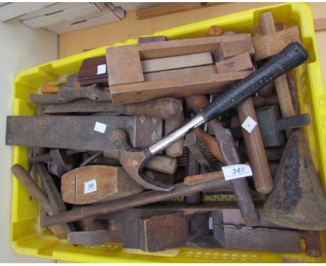 A large collection of tools including planes, saws, hammers etc