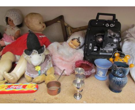 A Bell &amp; Howell projector, Model 256 EX together with dolls, toys, brass wares, pottery jugs, foot warmer, tennis