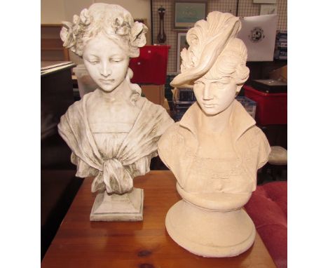 A reconstituted stone head and shoulders portrait bust of a maiden together with another portrait bust