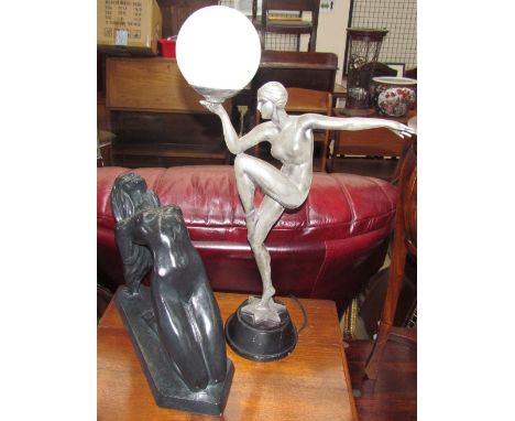 Austin Sculptures - A Danel, a sculpture of a naked maiden with back bowed together with an Art Deco style table lamp of a ma