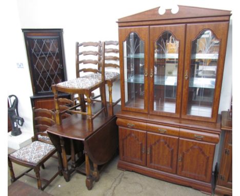 A 20th century oak gateleg dining table together with a set of five oak ladder back dining chairs, a modern wall unit and a m