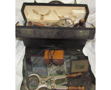 A bloodless Burdizzo castrator together with vets leather case and tools