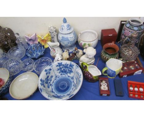 A Chinese blue and white pottery bowl together with a blue and white porcelain vase and cover, pottery jugs, portrait bust, g