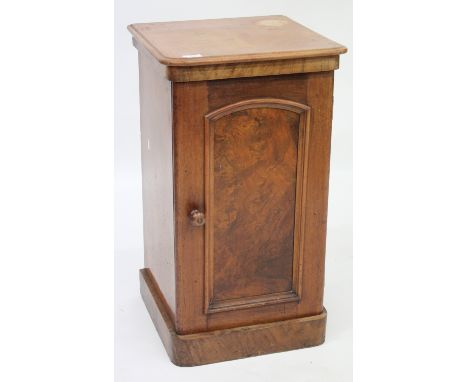 A VICTORIAN AND WALNUT POT CUPBOARD with single panelled door opening to reveal shelf within standing on plinth base, 41cm wi