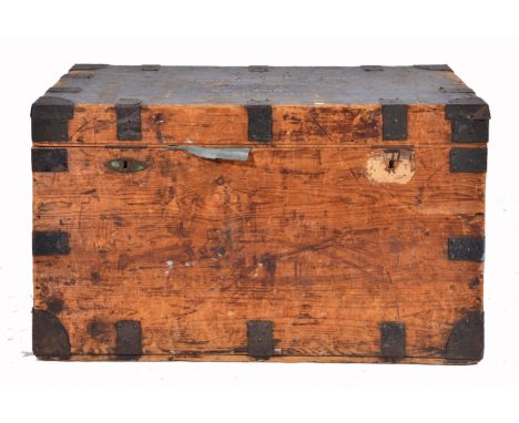 A PINE AND IRON BOUND TRAVELLING TRUNK, with iron handles to either end, approximately 99cm x 54cm x 57cm 
