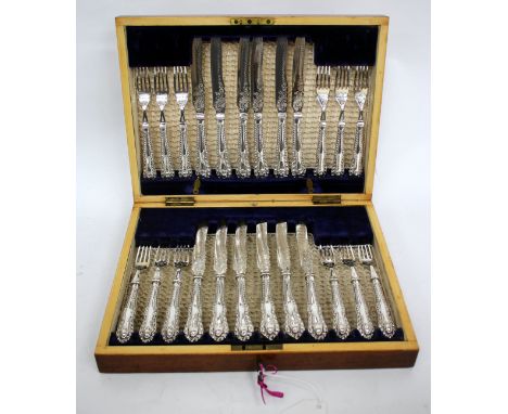 A CASED SET OF 12 PAIRS OF SILVER HANDLED FRUIT KNIVES AND FORKS, with marks for Sheffield and Yates Brothers 1904