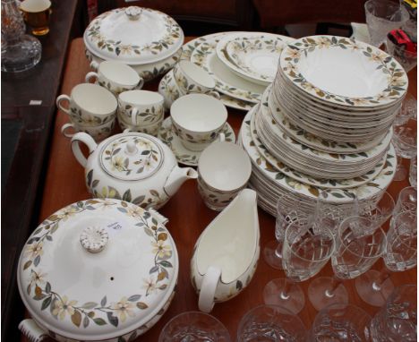 A PART DINNER SERVICE BY WEDGWOOD in the Baconsfield pattern, dinner plates, side plates, bowls, oval platters, vegetable tur