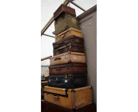 A HIDE WARDROBE TRUNK together with nine further various pieces of luggage, the trunk 91cm wide