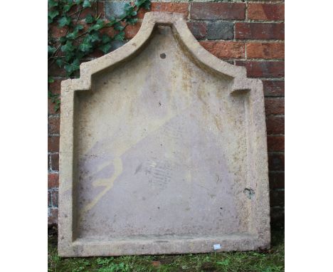 AN INDIAN SANDSTONE SHAPED SHALLOW BASIN of square form and with tapering spout, 77cm wide x 99cm deep x 11cm high