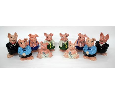 A COLLECTION OF TEN WADE NAT WEST POTTERY PIGGY BANKS 
