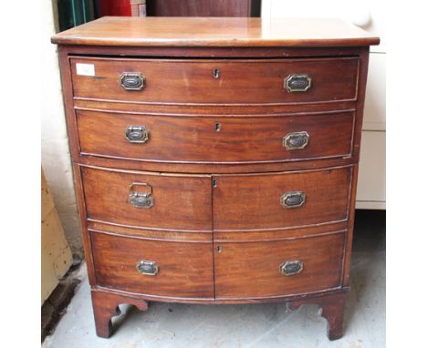 A GEORGIAN MAHOGANY BOW FRONTED COMMODE converted for use as a cupboard, 60cm wide together with a Victorian mahogany drop fl