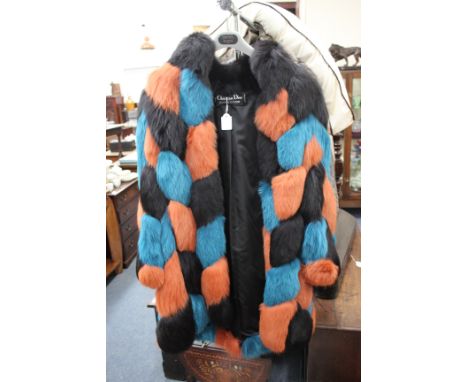 A CHRISTIAN DIOR BLUE, ORANGE AND BLACK FUR COAT