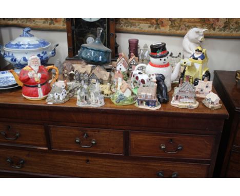 TWO CARLTONWARE NOVELTY TEAPOTS, a collection of Lilliput Lane model cottages and a Staffordshire cow creamer