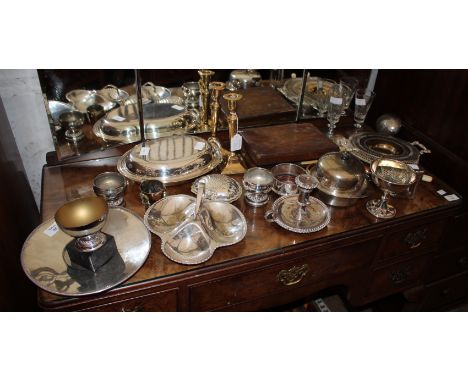 A QUANTITY OF SILVER PLATE to include a 19th century chamber stick and further items together with a pair of old brass candle