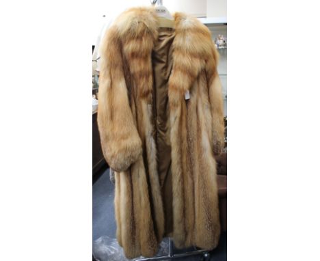 A NORWOOD FURS LONDON FOX FUR LONG COAT together with a Heath House Berkhampsted fox fur hat (2)