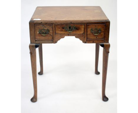 A GEORGIAN CADDY TOPPED MAHOGANY LOW BOY, with three various drawers and standing on turned tapering legs and pad feet, 53cm 