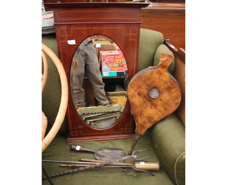 A STEEL TWO PRONGED TOASTING FORK together with further fire irons, a shovel, a pair of bellows etc and also a mahogany fire 