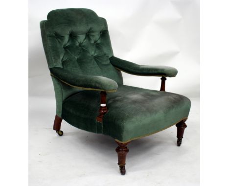 A VICTORIAN GREEN DRAYLON UPHOLSTERED BUTTON BACK ARMCHAIR with overstuffed upholstered seat and standing on ring turned tape