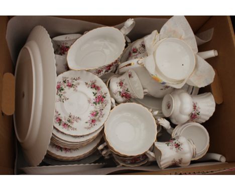 A QUANTITY OF ROYAL ALBERT LAVENDER ROSE PATTERN DINNER SERVICE, to include dinner plates, tea plates, coffee cups and saucer