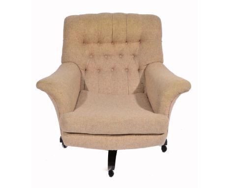 A 'G' PLAN BUTTON BACK UPHOLSTERED ROTATING ARMCHAIR 94cm wide 