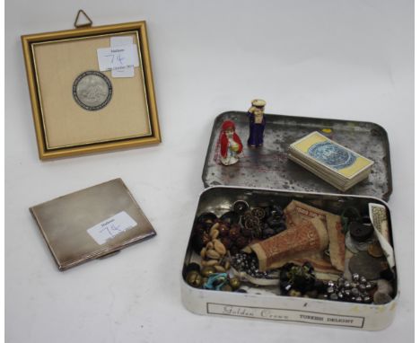 A SILVER CIGARETTE CASE with engine turned decoration, marks for Birmingham 1936, together with a framed white metal medallio