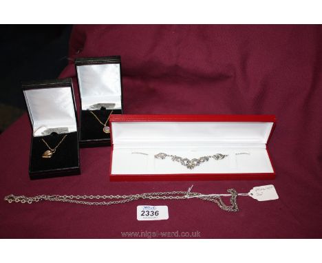 A 'Monet' silver coloured Necklace 26" long, marcasite Necklace, Opal Pendant with chain 16" long, and a heart Locket with ch