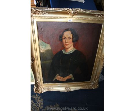 A large 19th c. Oil on canvas portrait of a woman
