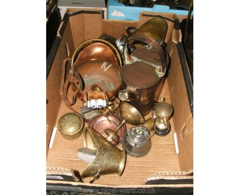 A quantity of brass and copper items including watering can, small scuttles, inkwell, nutcracker, etc