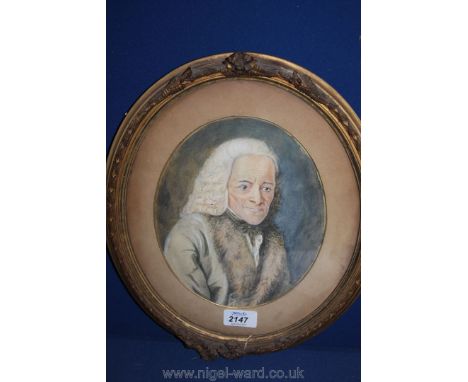 An Oval framed and mounted Pencil/Watercolour depicting a portrait of an elderly Gentleman in fur lined jacket and bow tie 