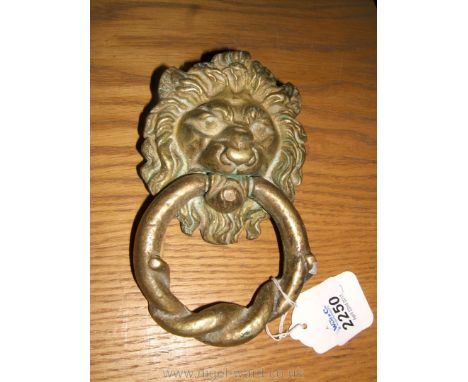 A brass Lion's head Door Knocker