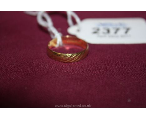 An 18ct gold Wedding Band Ring