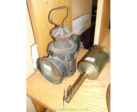 A Brass Spit Jack and an old Railway Lamp