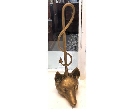 Brass door stop modelled as a fox head and riding crop