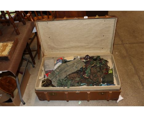 A wooden and leather bound trunk and contents containing 58 pattern webbing and other military related items etc