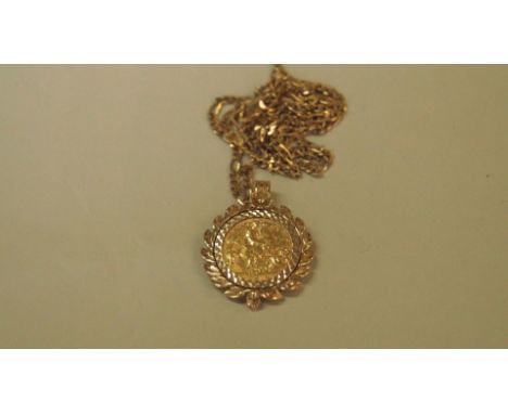 A George V gold half sovereign 1912, having 9ct pendant mount and 9ct figaro chain. Condition Report: Total weight: 16g.