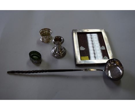 A toddy ladle having baleen handle; together with a plain rectangular silver photograph frame, and three other silver items.