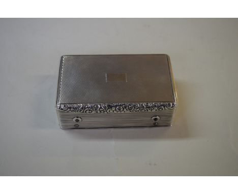 A rare and unusual George IV silver musical box, by Thomas Edwards, London 1823, the hinged lid decorated with engine turning