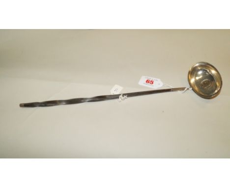 An unmarked Georgian white metal and baleen toddy ladle, inset George IV shilling, 34cm.