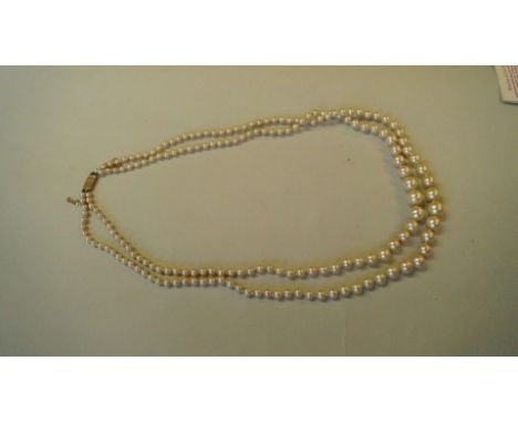 A vintage Ciro graduated double row faux pearl necklace having 9ct gold clasp.