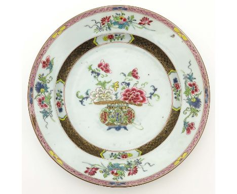 Decorated with flowers in vase with floral border, 29 cm. in diameter, chip.