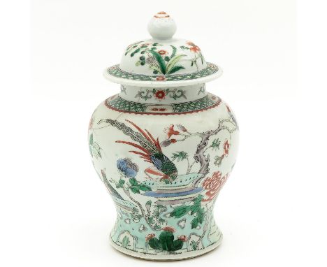 Decorated with flowers and birds, Kangxi mark, 26 cm. tall, hairline.