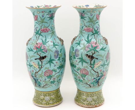 Light green ground decorated with flowers and birds in Famille Rose enamels, butterfly handles, 60 cm. tall, one restored on 