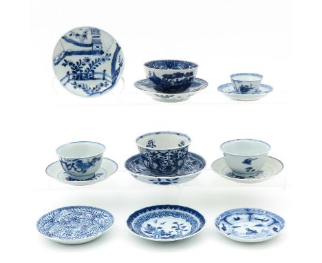 Including 5 cups and 9 saucers, in blue and white decors, largest saucer is 13 cm. in diameter, in diverse conditions.