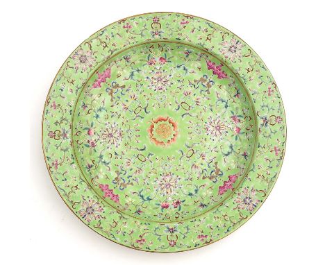 Light green ground with decor of flowers and bats in Famille Rose enamels, Jiaqing mark, 38 cm. in diameter, chip.