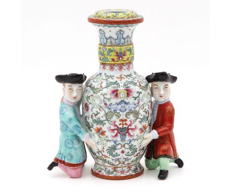 Depicitng 2 men holding vase, 23 cm. tall. 