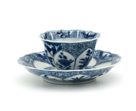 Decorated with flowers and Chinese figures, Kangxi Period, lotus leaf form saucer is 11 cm. in diameter. 