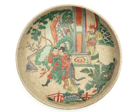 Decorated with Chinese figures in garden, Kangxi mark, 28 cm. in diameter.