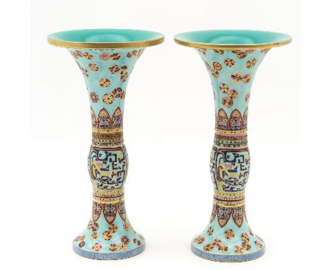 Light blue ground with gilt floral decors, Qianlong mark, 35 cm. tall. 