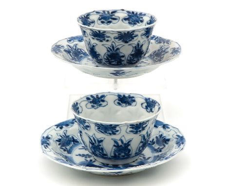Floral decor, marked with double ring and Jade mark, saucers are 13 cm. in diameter, hairline.
